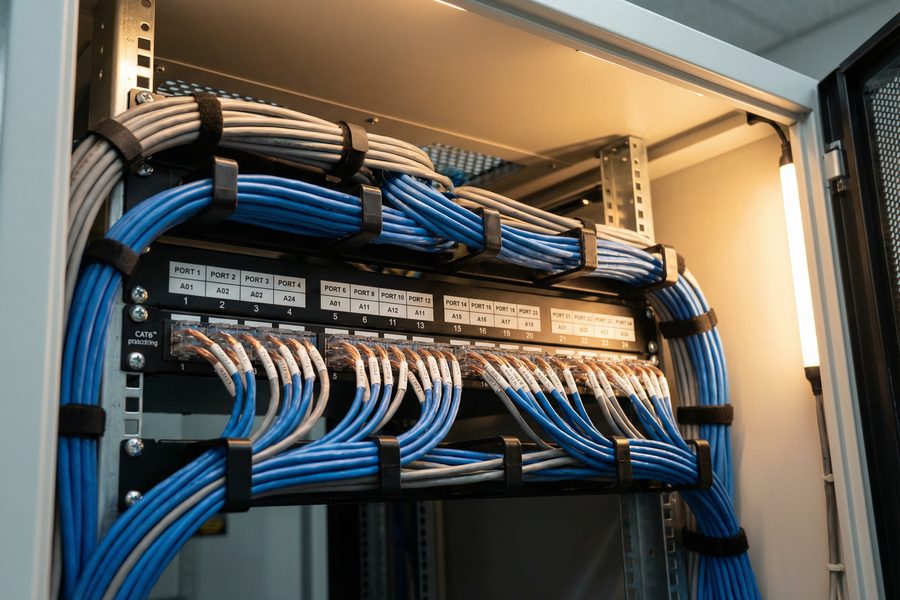 Technician working with network cables